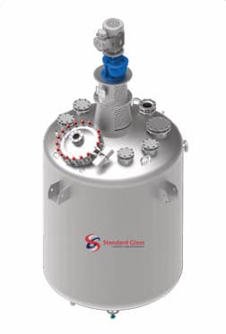 A glass-lined reactor with agitator drive and nozzles.
